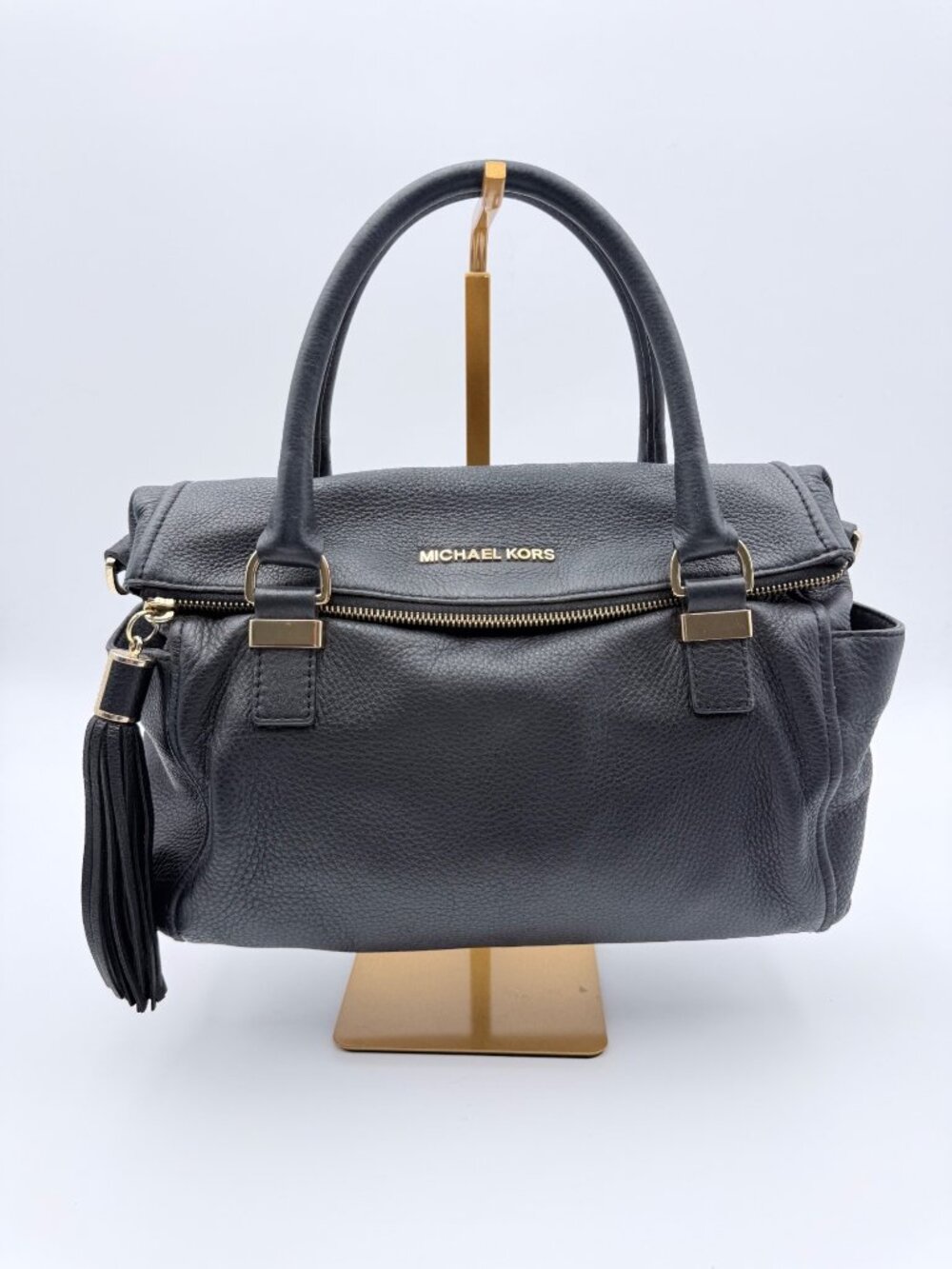 Michael Kors Women’s Black Pebbled Leather Satchel Bag  Tassel & Gold Hardware